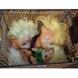 A vintage wicker basket containing five Thomas Dam and other 1970's/80's troll dolls