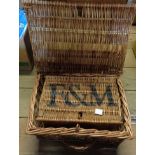 Two graduated Fortnum & Mason wicker hampers
