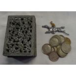 A small antimony pierced box containing a small quantity of assorted British and other coinage