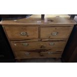 An 84cm Victorian waxed pine chest of two short and two long graduated drawers, set on raised turned