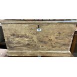 An 80cm Victorian pine lift-top box with flanking iron drop handles