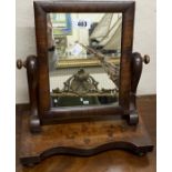 A small Victorian mahogany platform dressing table mirror with serpentine front base