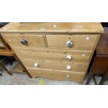 A 100cm 19th Century waxed pine chest of two short and three long graduated drawers, set on deep