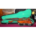 A cased Blessing violin and bow