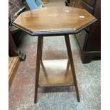 An Edwardian inlaid mahogany two tier occasional table with octagonal top and slender square