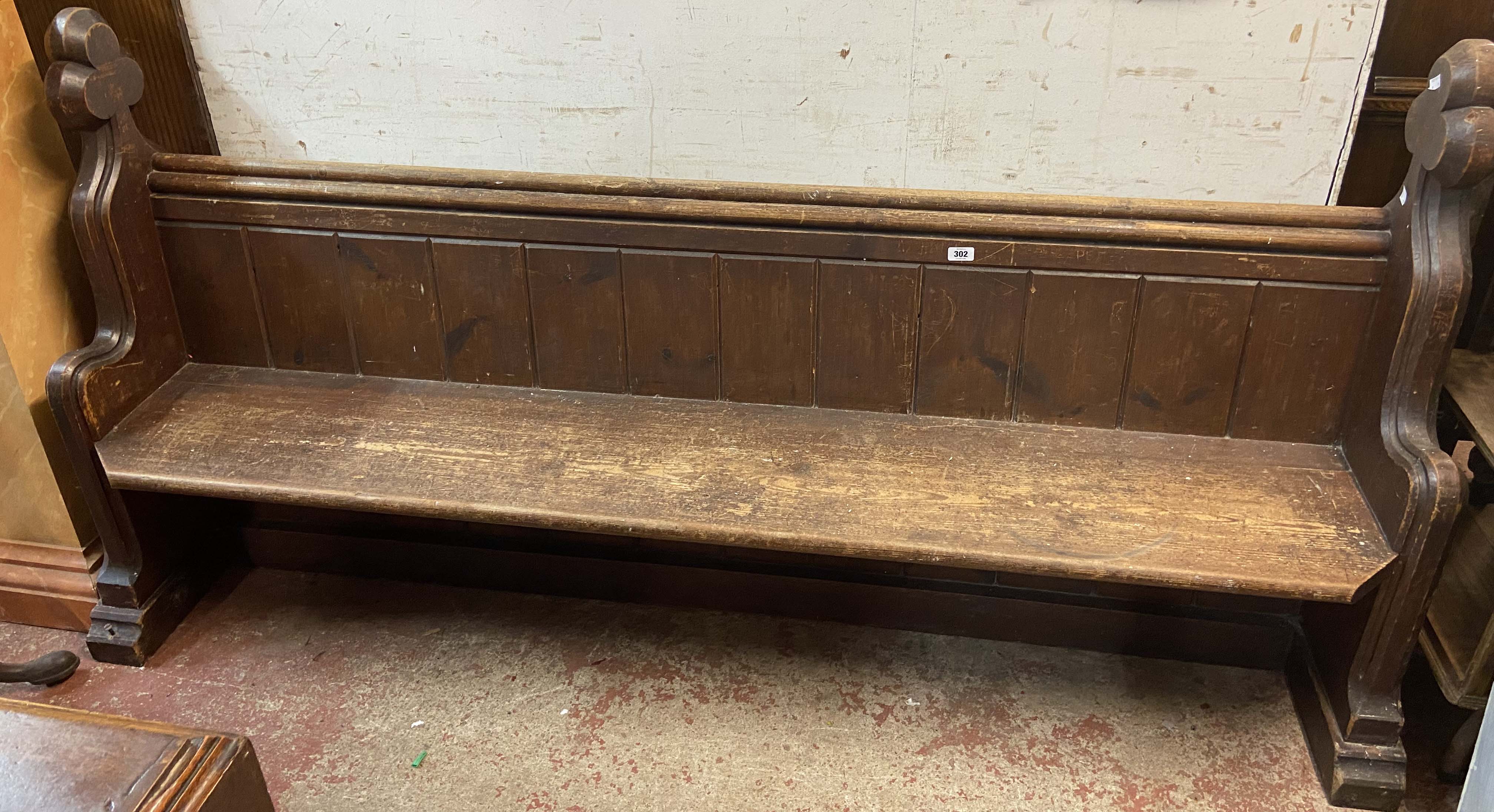 A 2.05m Victorian stained pine church pew with Gothic pattern ends