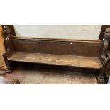 A 2.05m Victorian stained pine church pew with Gothic pattern ends