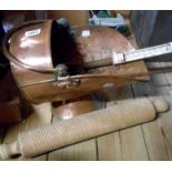 A copper helmet form coal scuttle - sold with an antique ribbed rolling pin, cooking thermometer and
