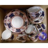 A box containing a Victorian tea set and a Royal Doulton figurine Monica HN1407 (a/f)