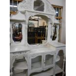 A 1.37m early 20th Century later painted mirror back sideboard with multi bevelled plates, shelves