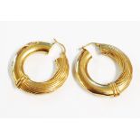 A pair of 9ct. gold hoop ear-rings