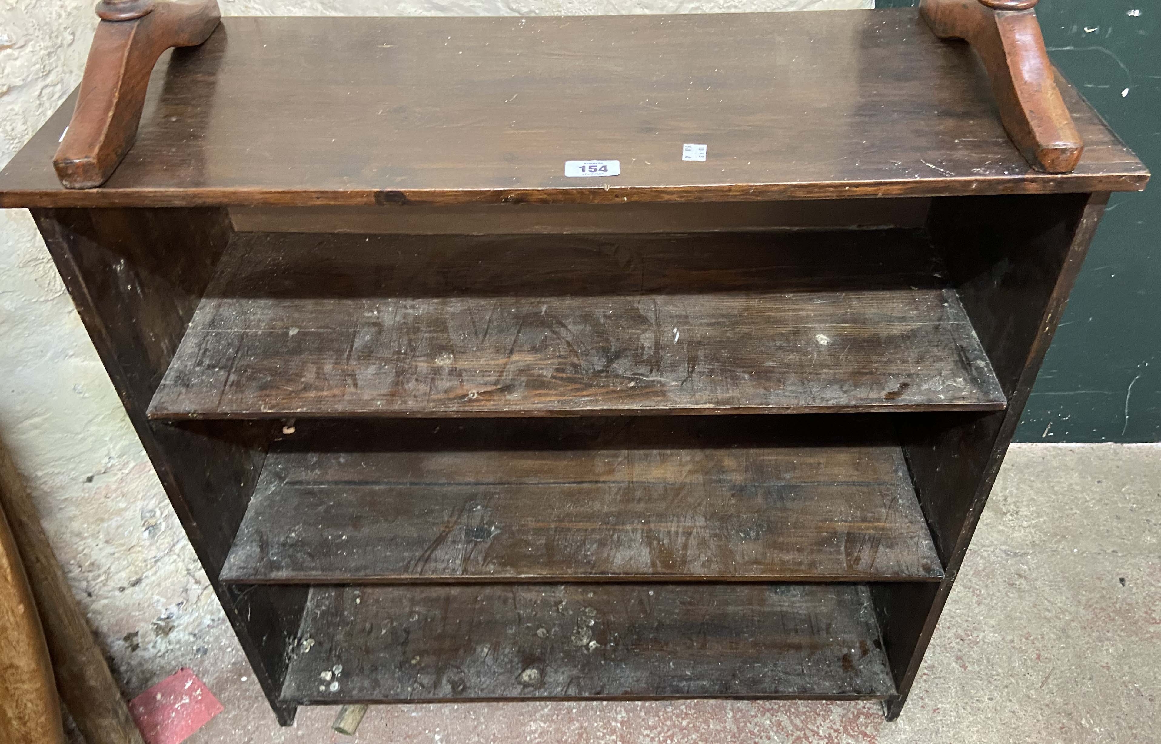 A 79cm vintage stained wood three shelf open bookcase