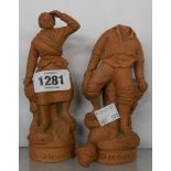 A pair of Belgian terracotta figures, signed and numbered and titled with Ostende to front - one