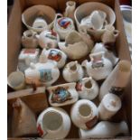 A box containing a quantity of mainly Goss crested china items including WWI incendiary bomb, etc.