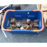 A crate containing assorted weights