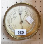 A small antique brass cased sedan style barometer with temperature scale and aneroid works - glass