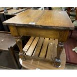 A stained walnut tea table with slatted undertier and turned supports