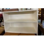 A 90cm painted wood two shelf open bookcase