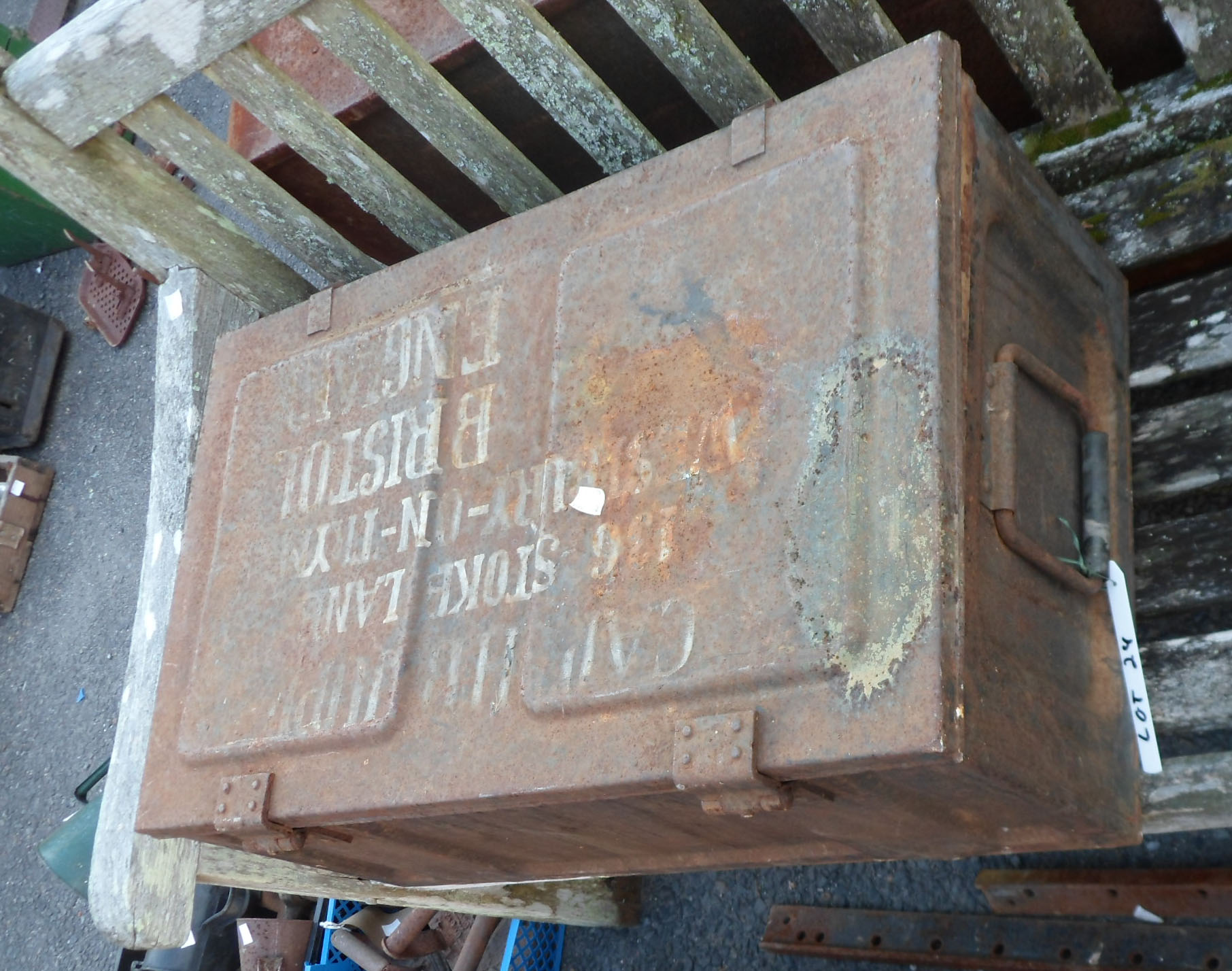 A metal ammunition case marked CAP HB JUP, Stokeland, Westbury-on-Tyne,Bristol and contents