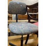 A vintage office swivel chair with machine tapestry upholstery