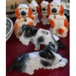 Two Metzler & Ortloff porcelain dog figurines - sold with a pair of vintage Staffordshire dog