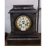 A late Victorian black slate and marble cased mantle clock with eight day gong striking movement