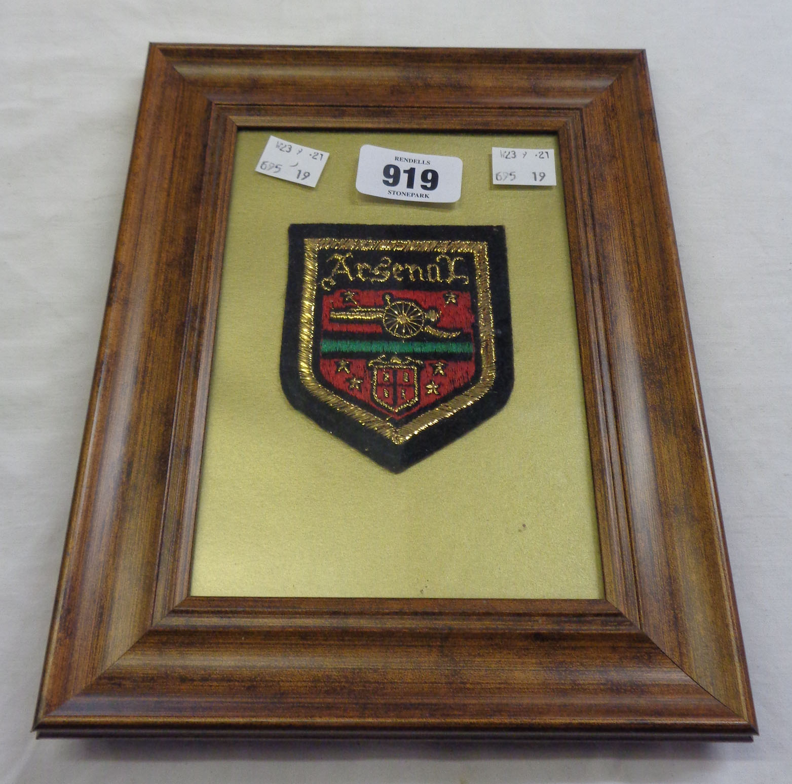 A framed 1971 Arsenal embroidered blazer badge