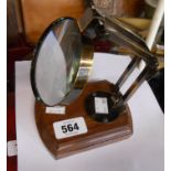 A modern adjustable desk magnifier