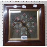 A 19th Century rosewood framed beadwork panel with repeat motif