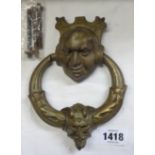 A Victorian gilt brass door knocker and fittings with ruddy faced gentleman and Mephistophelen