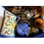 A box containing assorted ceramic items including blue and white sauce tureen and stand, cheese