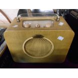 A vintage Ever Ready Sky Queen portable valve radio with faux snakeskin case and perspex handle