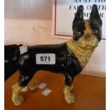A modern painted cast metal model of a French bulldog