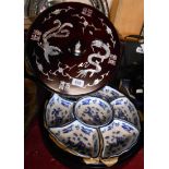 A modern Chinese wooden Lazy Susan with mother-of-pearl inlay and fitted blue and white porcelain