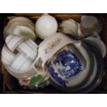 A box containing assorted teaware and other ceramics