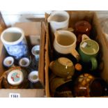 Two boxes containing assorted ceramic items including St Ives pottery jugs, etc.