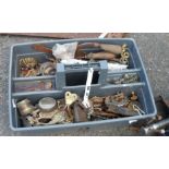A tray containing various brass and other handles, locks, lenses, etc.