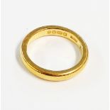 A 22ct. gold wedding band - 1922