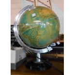 A vintage light up globe