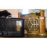A vintage Pilot Bakelite radio (one knob missing) - sold with a modern wooden cased radio