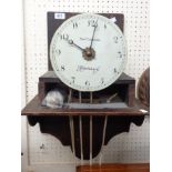 A 19th Century mahogany and mixed wood cased wall clock, the 23cm diameter dial marked for Samuel