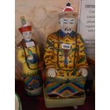 A large 20th Century Chinese porcelain figure of a seated official with colourful decoration -