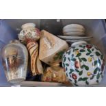 Three boxes containing assorted ceramics and glassware including cheese dishes, glasses, bowls,