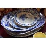 A small selection of pottery meat and other plates including blue and white, etc.