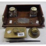 An Edwardian wooden inkstand with carved gallery and two inkwells - sold with another inkwell, brass