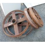 Two pairs of old iron barrow wheels