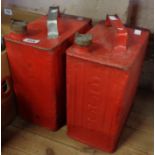 Two old Esso petrol cans with later red paint finish and brass caps