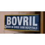 A modern cast metal painted Bovril sign