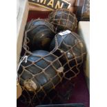 A set of four ABC Brand ebony bowls in original net bag