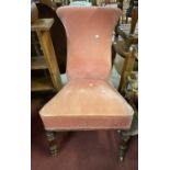 A 19th Century prei dieu chair with later old rose velour upholstery, set on turned and reeded front